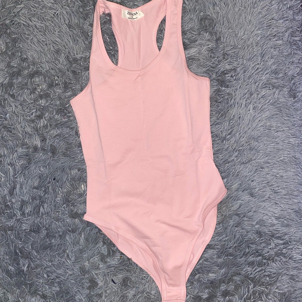 Pink colored bodysuit